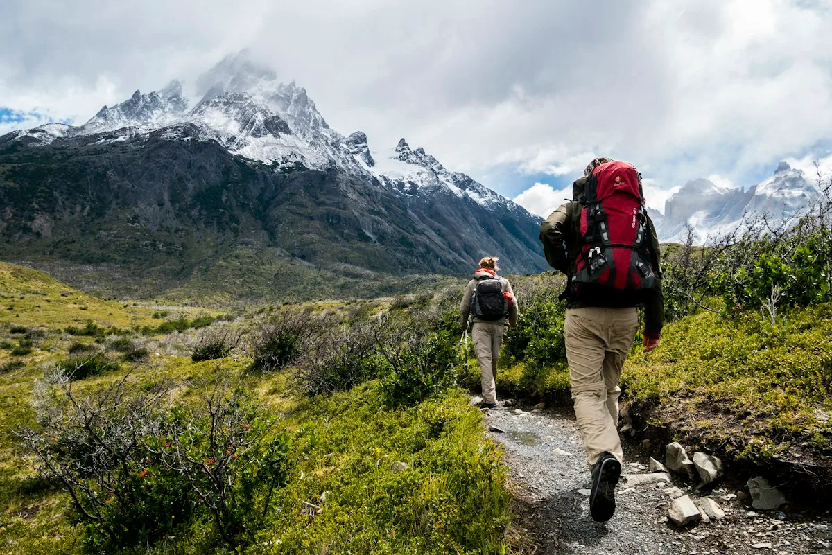 Hiking boots and mountaineering backpack on a Himalayan pass
